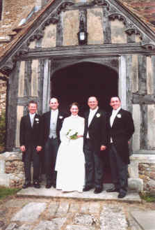 Bride and men in suits