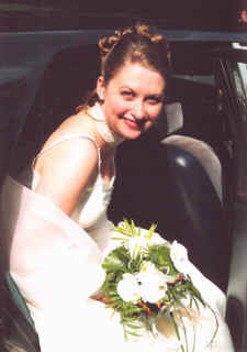 Karen getting into the wedding car
